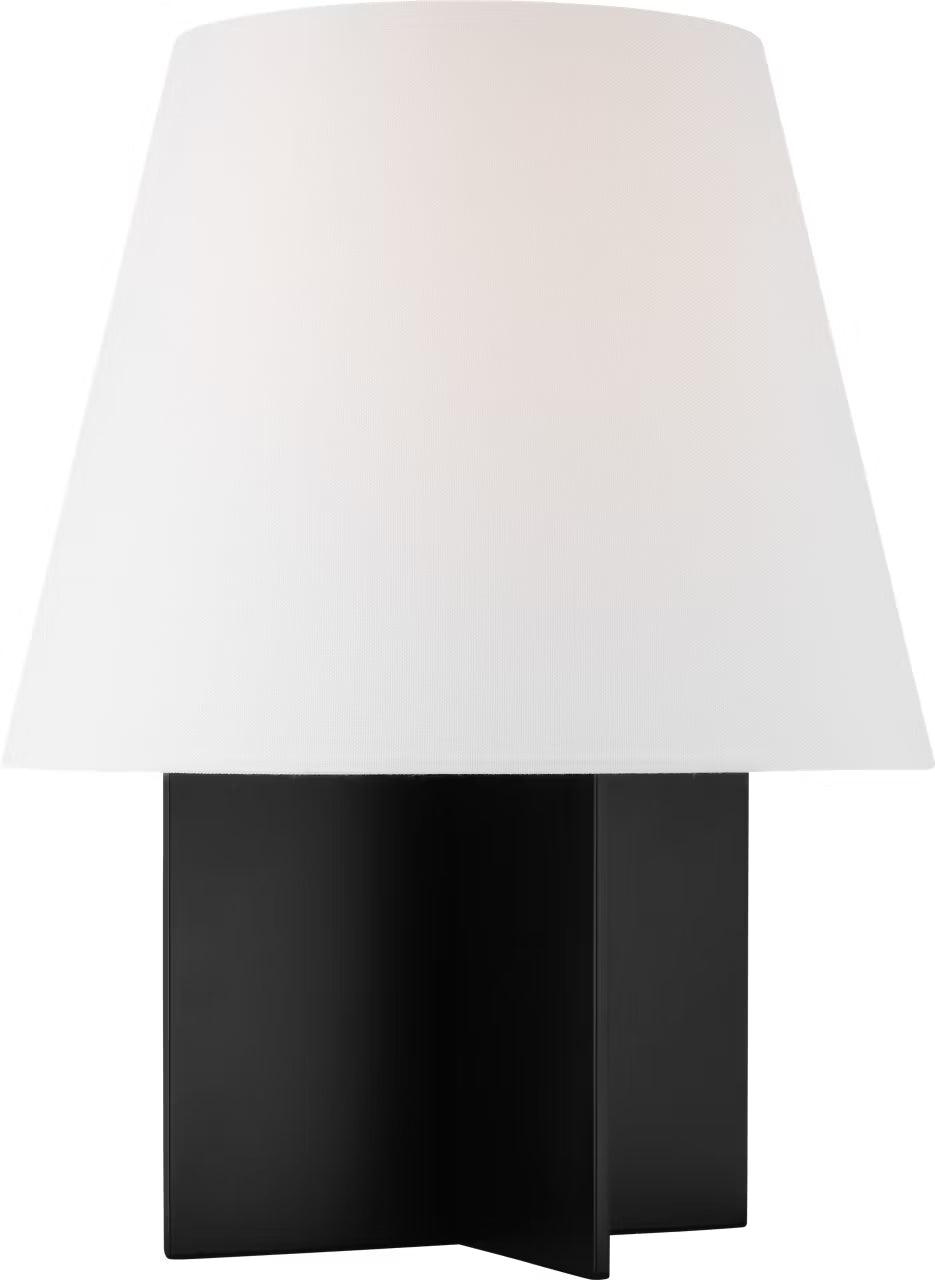 Table lamp with a white shade and black base on a white background
