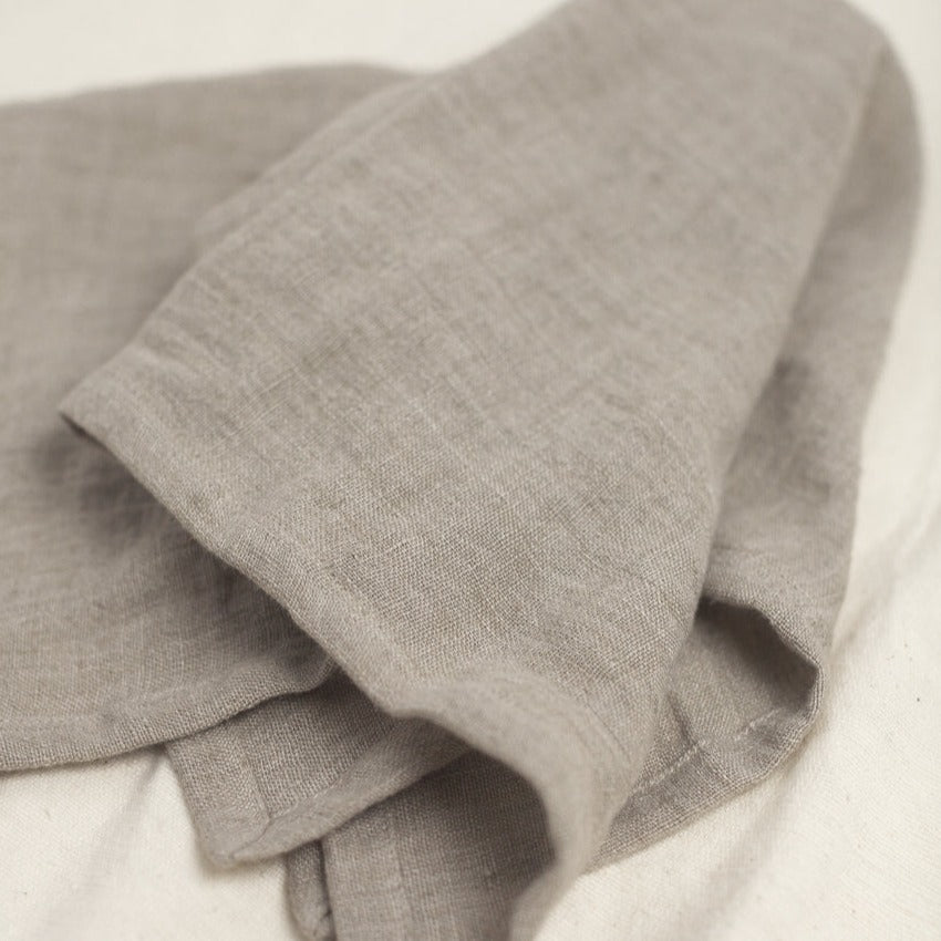 Folded gray fabric on a light background