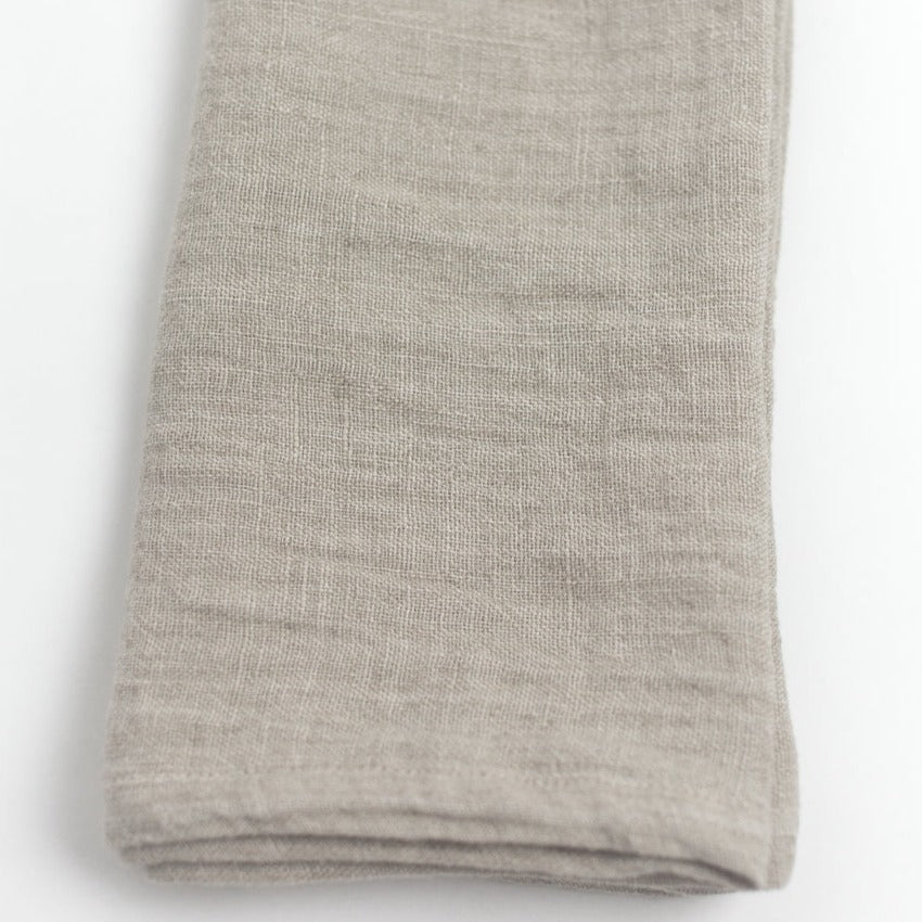 Folded gray fabric on a white background