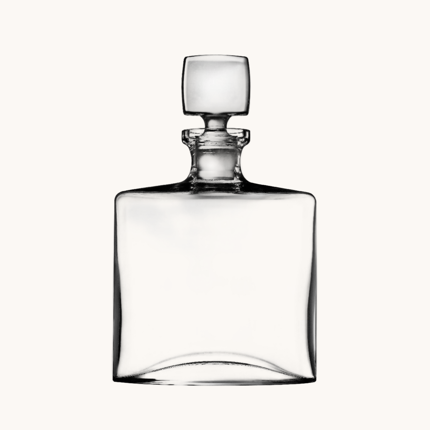 Clear glass decanter on a white background