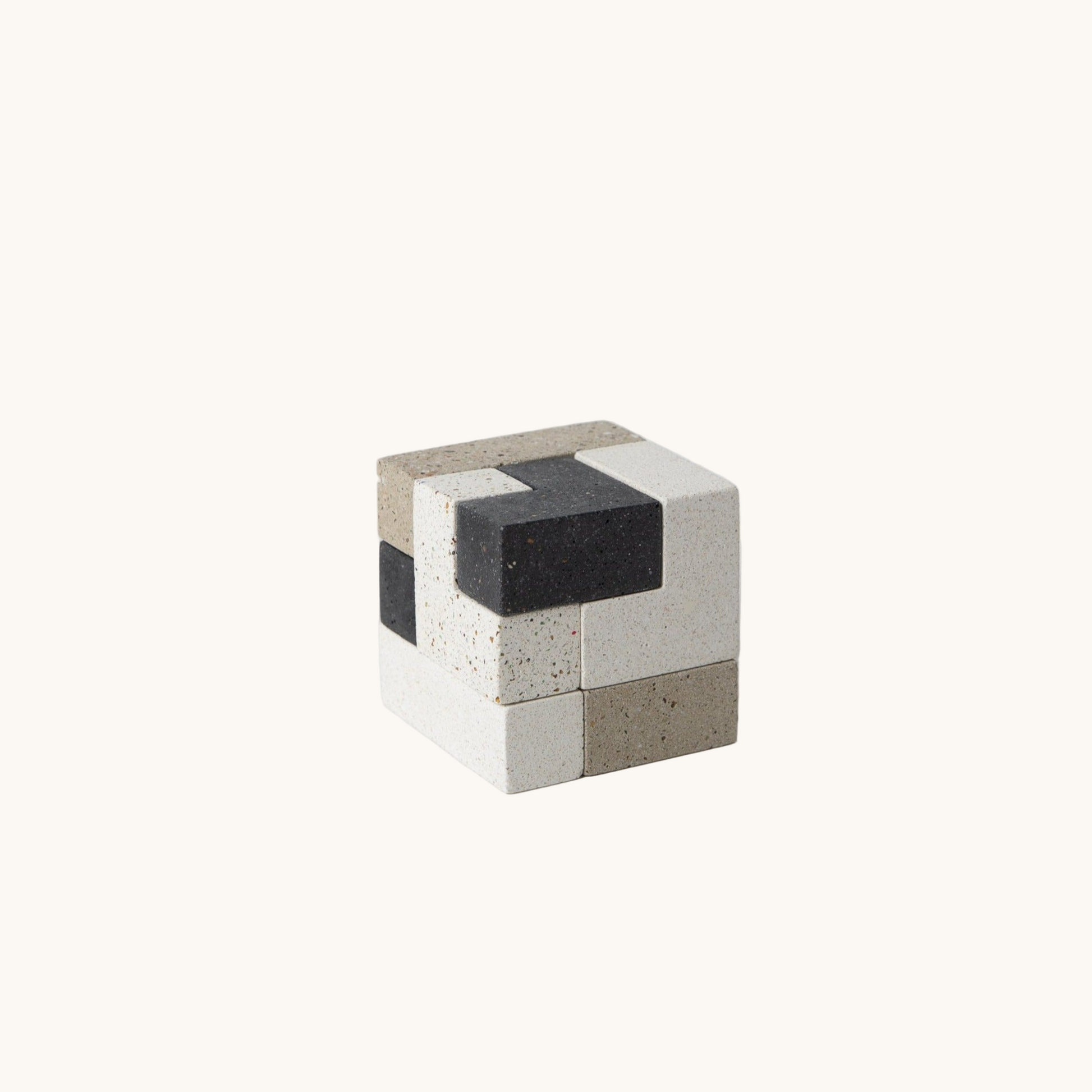 Cement block with black and gray pattern on a white background