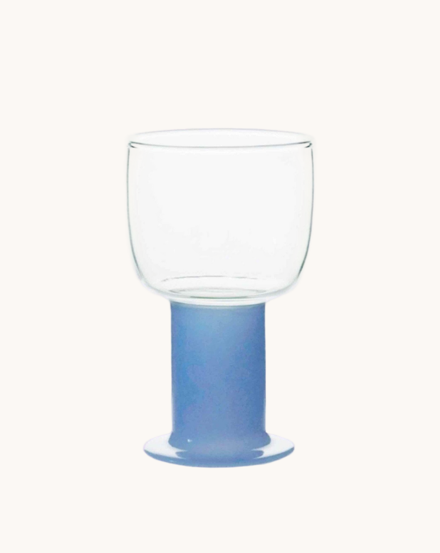 Clear glass with a blue base on a white background