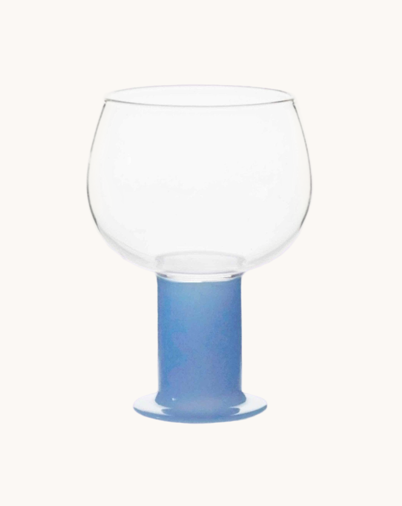 Clear glass with a blue base on a white background