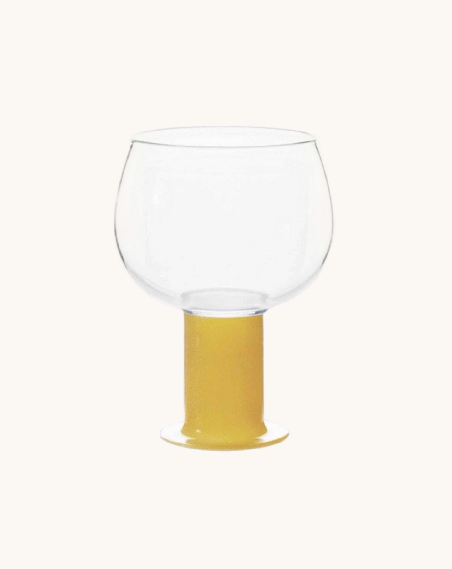 Clear glass bowl with a yellow base on a white background