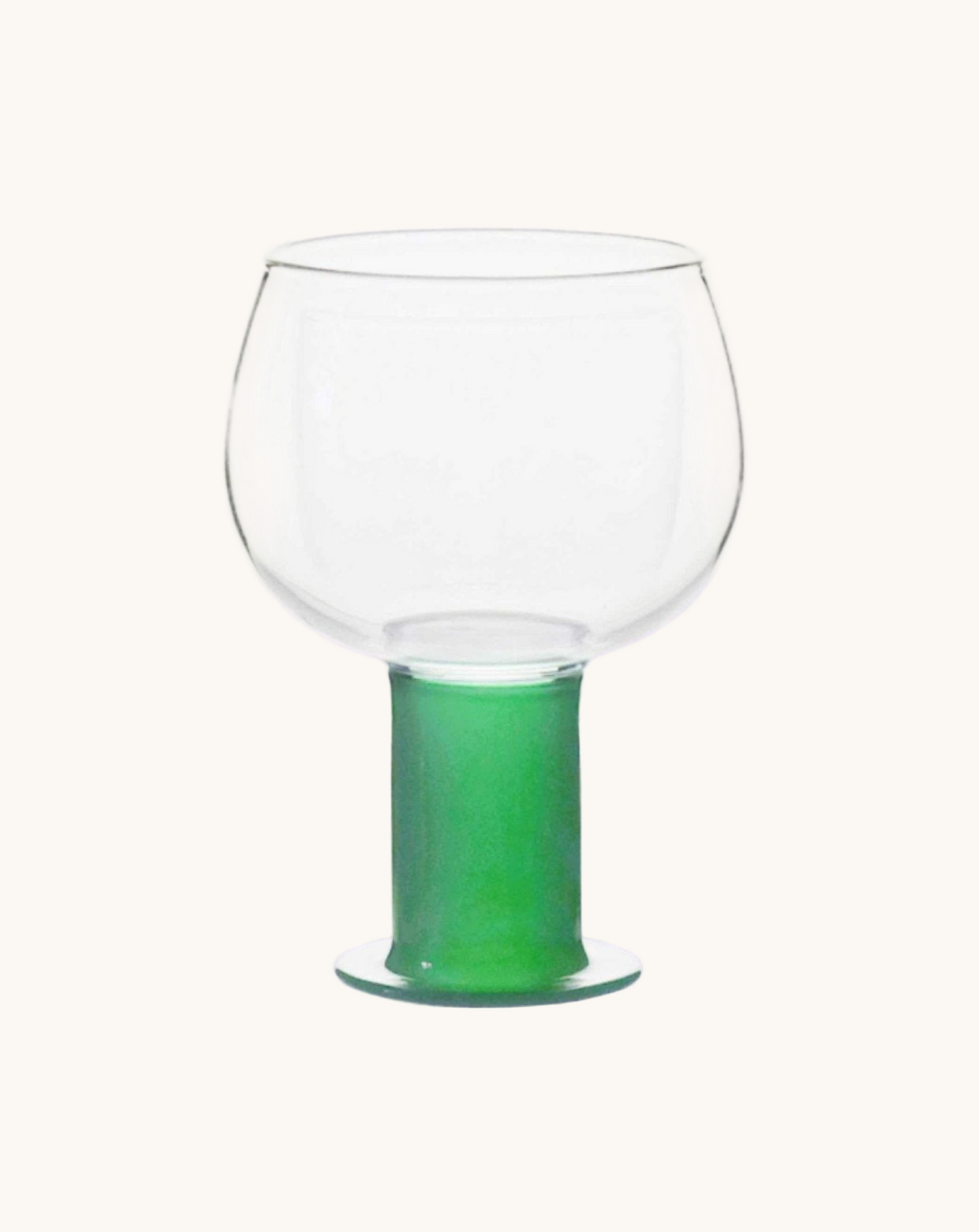 Clear glass with a green base on a white background
